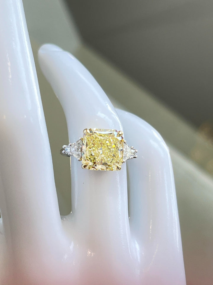 Fancy Yellow Diamond Engagement Ring with Two .52ct Trapezoid Diamonds and Two .18ct Tapered Baguettes