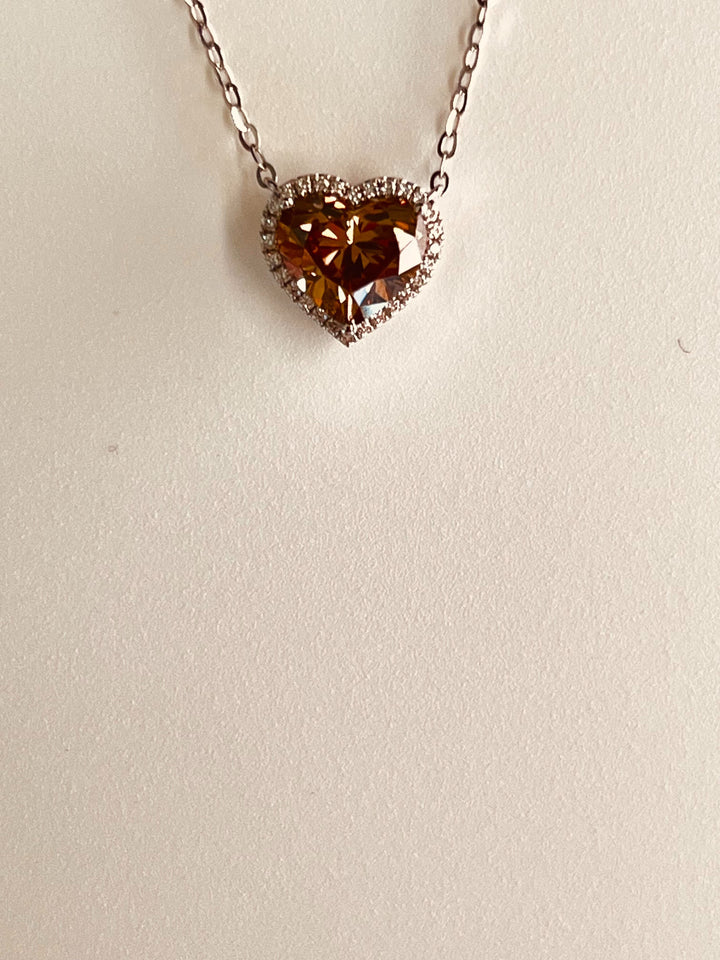 18K White Gold Heart Necklace Featuring a .85ct Fancy Brown Diamond with .07ctw White Diamond Accents