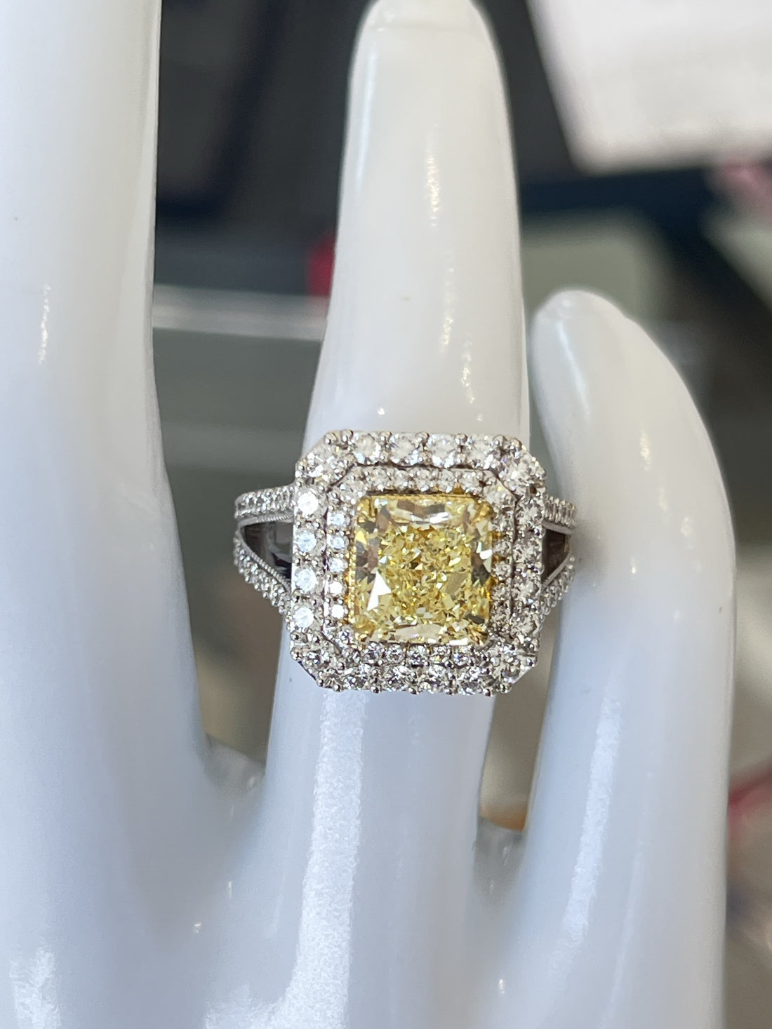 18K White Gold Ring Featuring a 2.77ct Fancy Yellow VVS2 Diamond with 1.73ctw White Diamond Accents