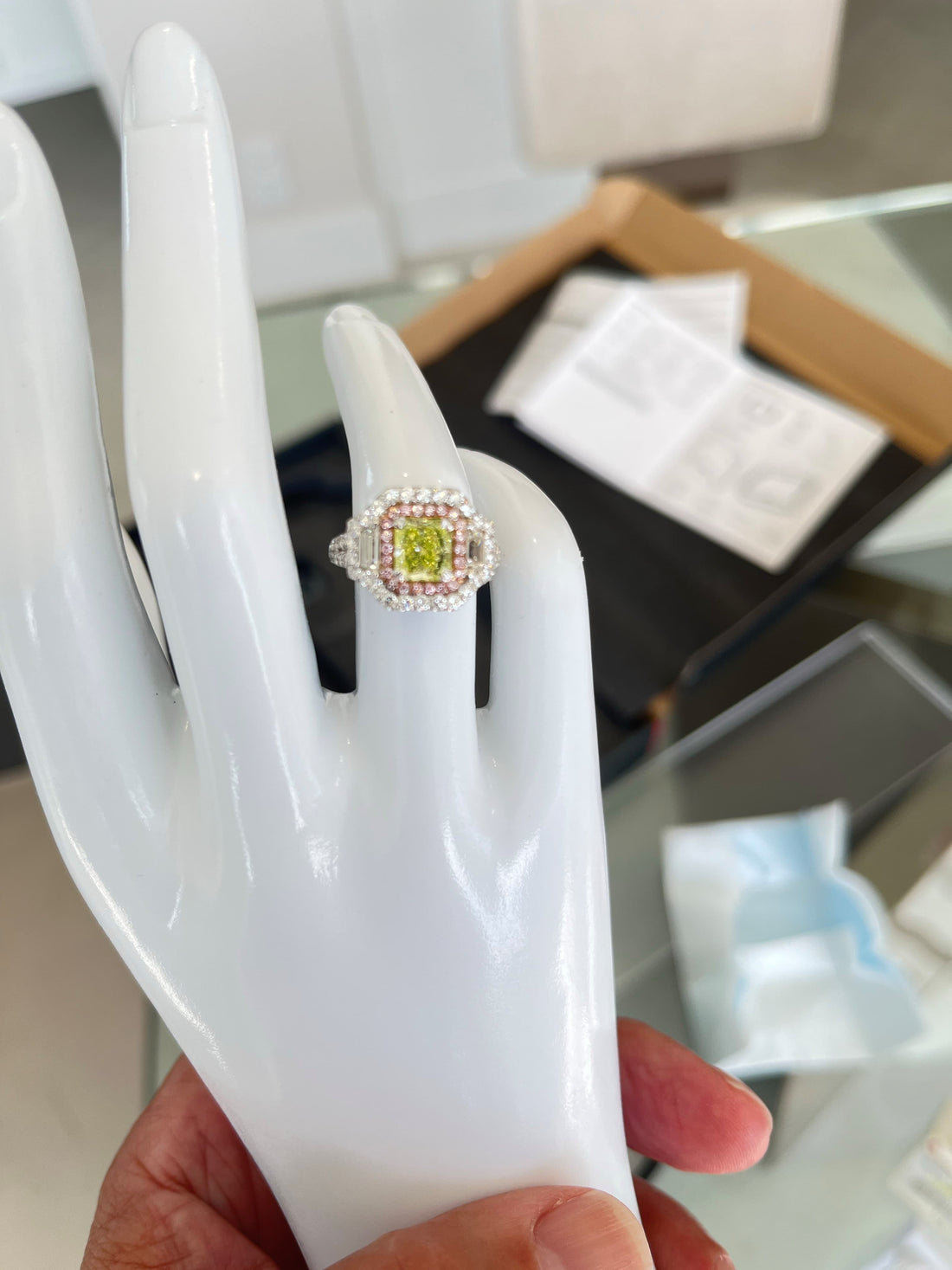 18K White Gold Ring Featuring a 1.32ct Fancy Intense Neon Green Diamond with Natural Pink Diamonds (.14ctw), Round Diamonds (.94ctw), and Trapezoid Diamonds (.41ctw)