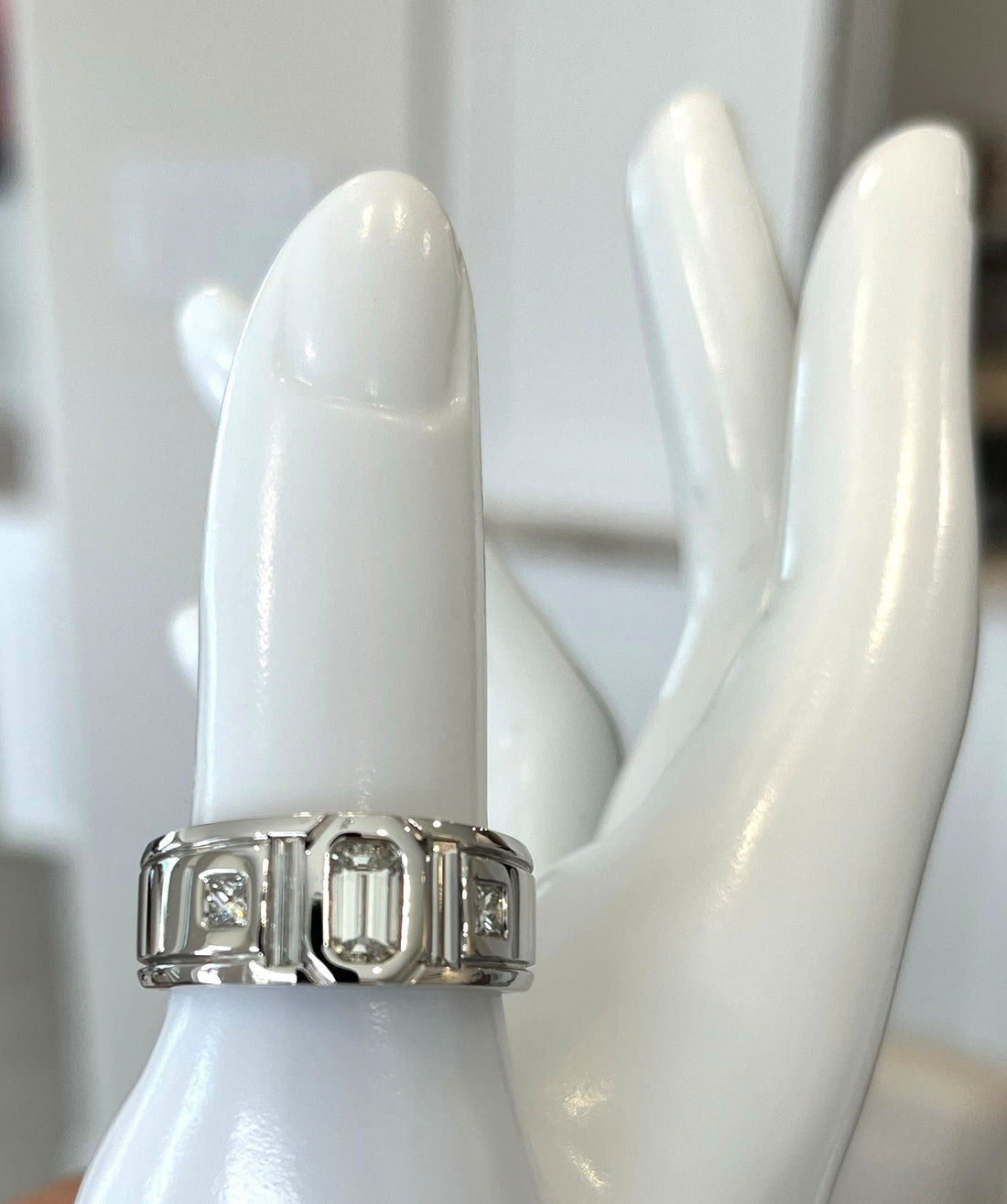 18K White Gold Men's Diamond Band Featuring a .80ct Emerald-Cut Diamond with .55ctw Baguette Diamonds and .30ctw Princess-Cut Diamonds, 9.5mm Wide, Size 7ľ