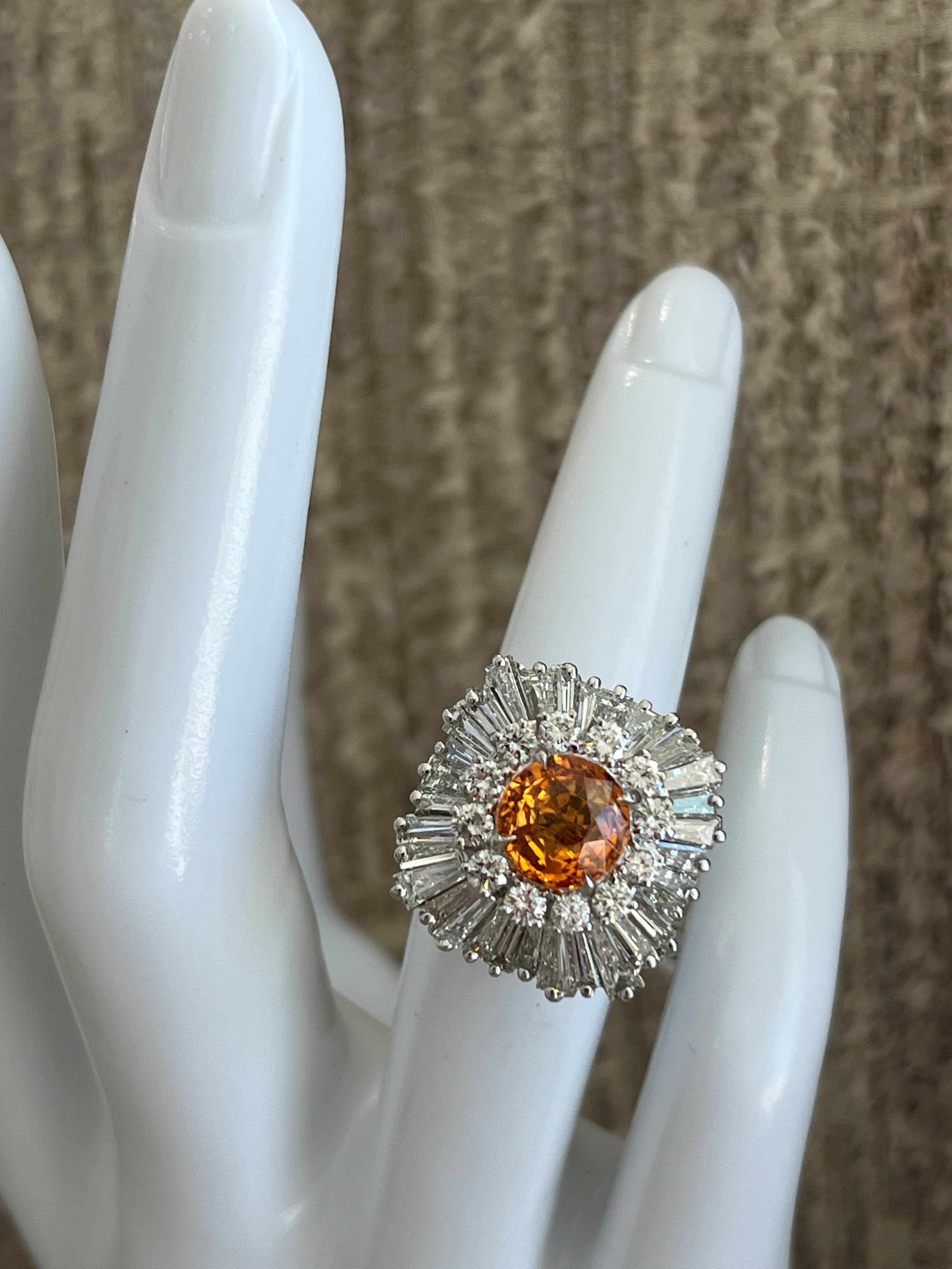 Platinum Ballerina Ring Featuring a 3.08ct Garnet with .72ctw Round Diamonds and 2.00ctw Baguette Diamonds