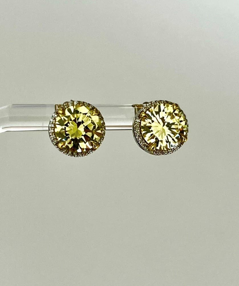 14K Gold Diamond Earrings Featuring a 2.09ct GIA-Certified Fancy Yellow VS2 Round Brilliant Diamond, a 2.01ct Fancy Yellow SI2 Round Brilliant Diamond, and .23ctw White Diamonds