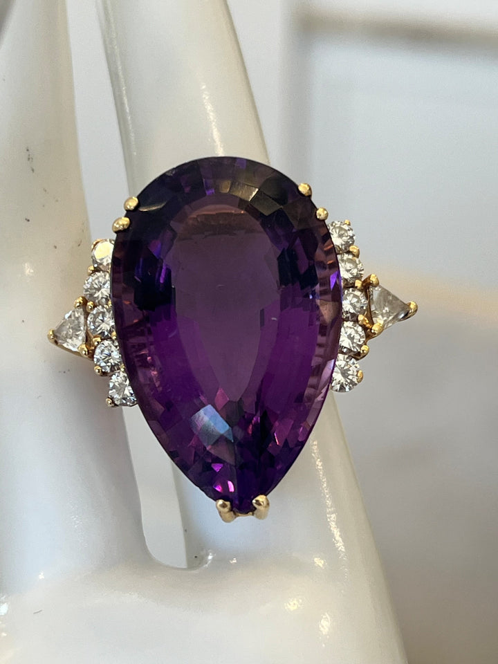 18K Yellow Gold Ring Featuring a 35.00ct Amethyst with 1.25ctw Diamond Accents