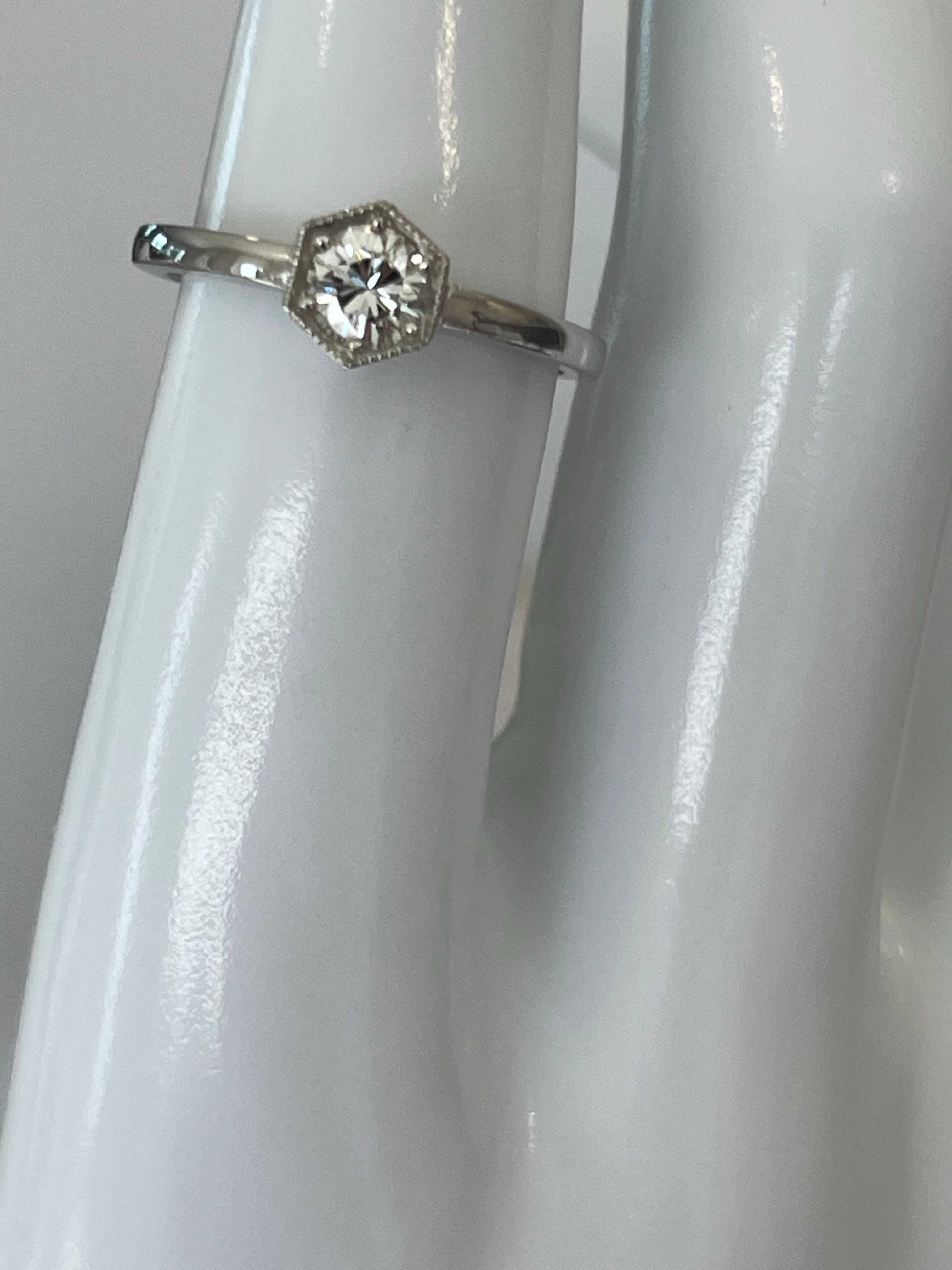 Platinum Ring Featuring a .43ct H VS1 Round Brilliant Diamond with a Milgrain Edge