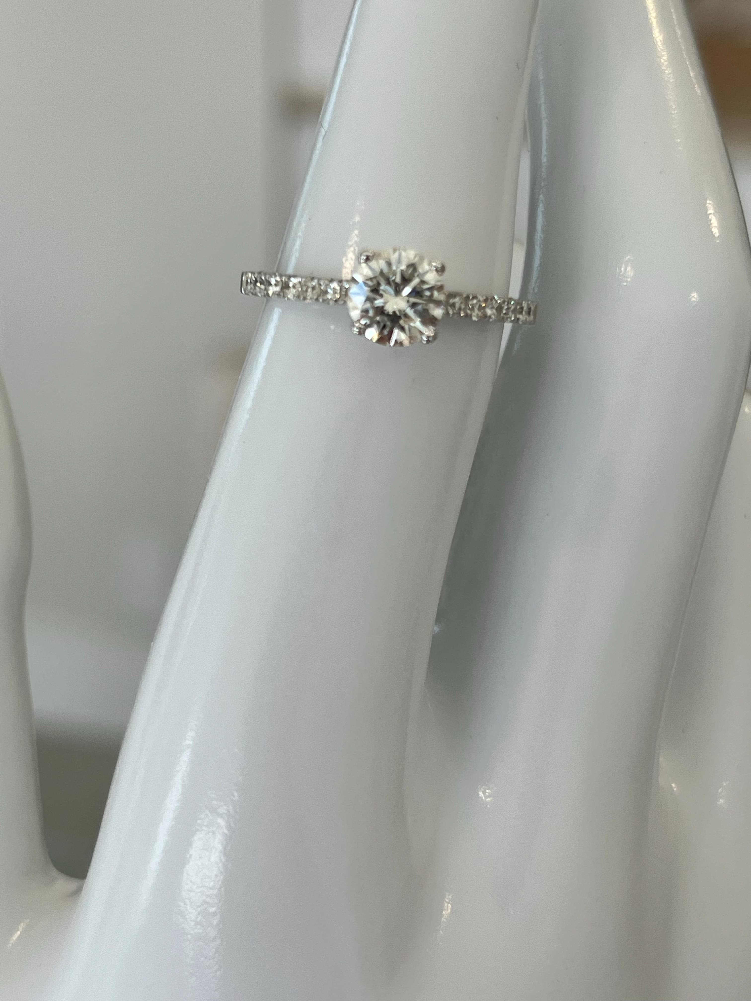 14K White Gold Engagement Ring Featuring a .74ct J VS1 Round Brilliant Diamond with .26ctw Diamond Accents