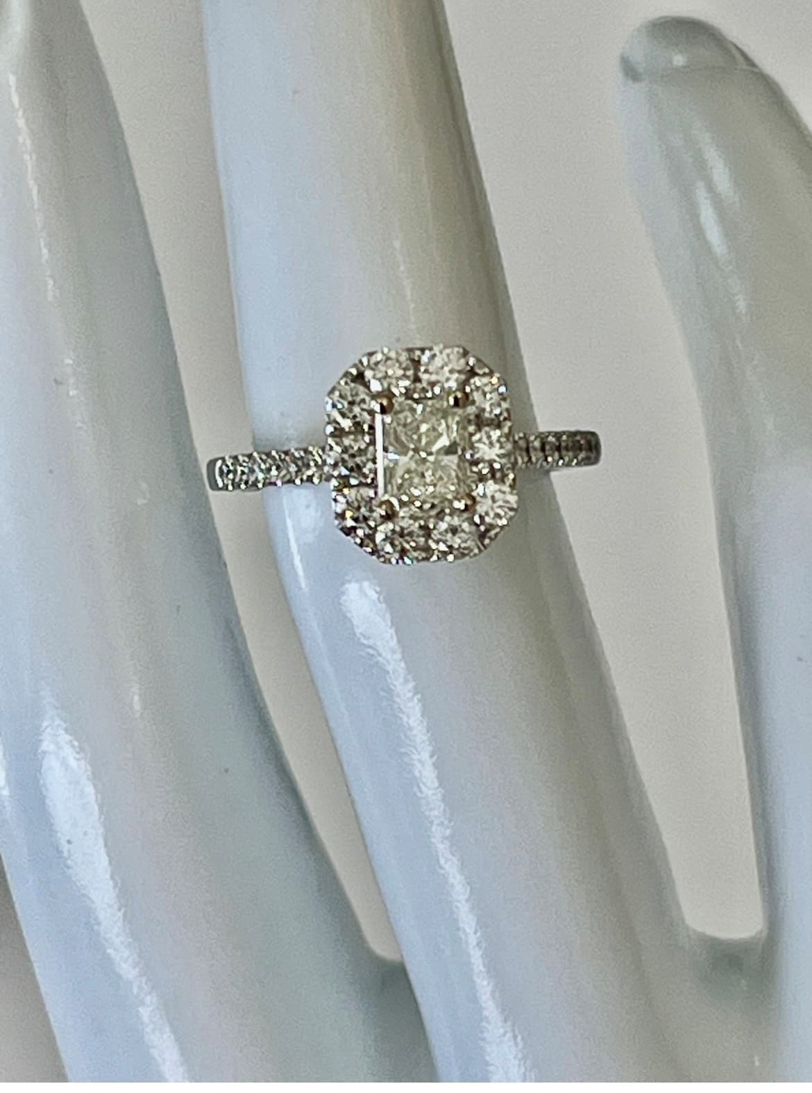 14K White Gold Halo Engagement Ring Featuring a .71ct I VS2 Elongated Radiant-Cut Diamond with .75ctw Diamond Accents