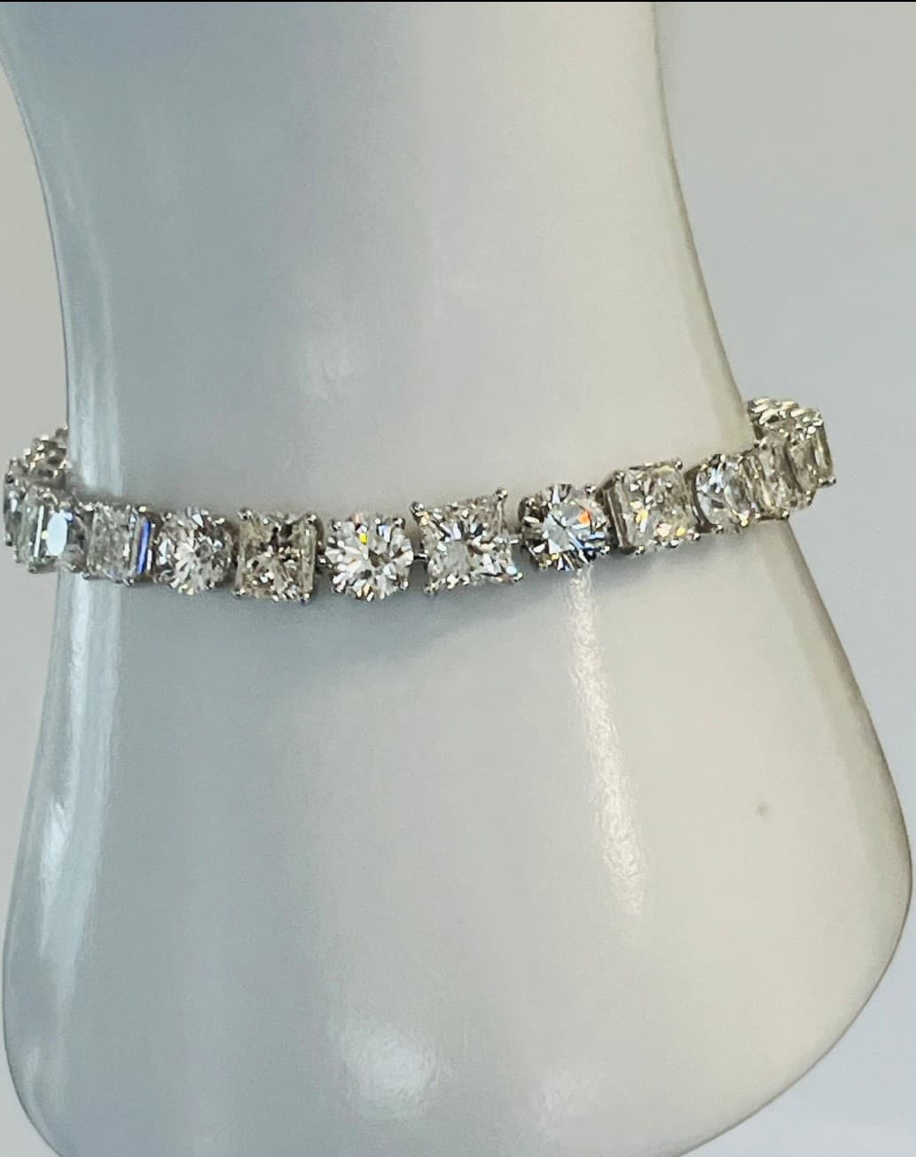 18K White Gold Graduated Diamond Tennis Bracelet Featuring 25.84ctw Diamonds