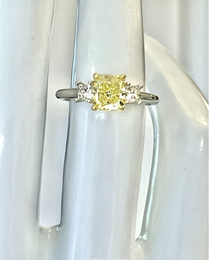 Platinum and 18K Yellow Gold Ring Featuring a 1.39ct GIA-Certified Fancy Light Yellow I1 Radiant-Cut Diamond with .39ctw Princess-Cut Diamond Accents