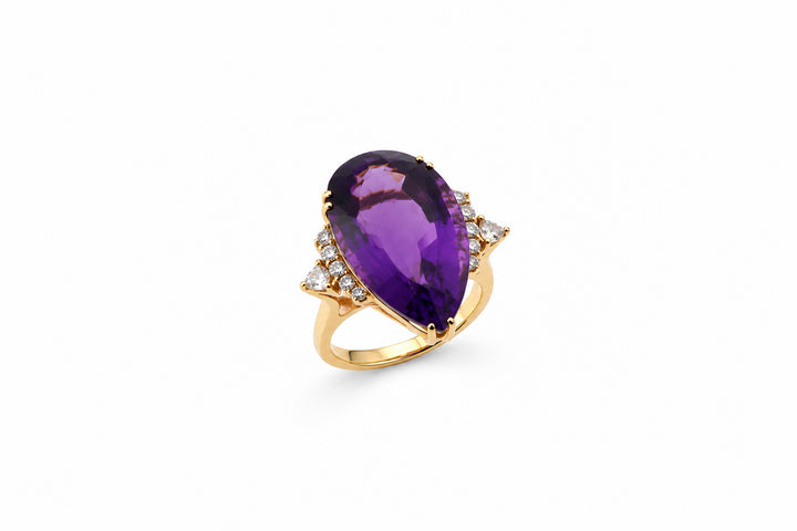 18K Yellow Gold Ring Featuring a 35.00ct Amethyst with 1.25ctw Diamond Accents