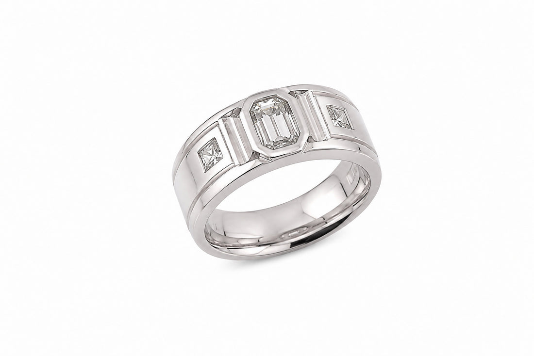 18K White Gold Men's Diamond Band Featuring a .80ct Emerald-Cut Diamond with .55ctw Baguette Diamonds and .30ctw Princess-Cut Diamonds, 9.5mm Wide