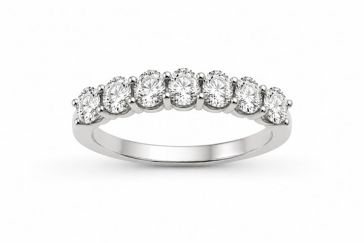 Platinum Halfway Around Oval Diamond Anniversary Band Featuring .58ctw Diamonds ring