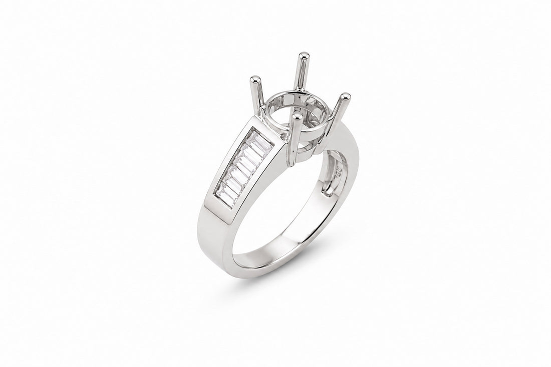 18K white gold engagement ring mounting with channel-set baguette diamonds and round center stone setting
