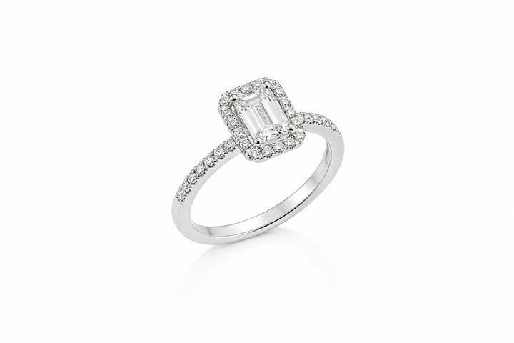 14K White Gold Halo Ring Featuring a 1.00ct H SI2 Emerald-Cut Diamond with .26ctw Diamond Accents engagement