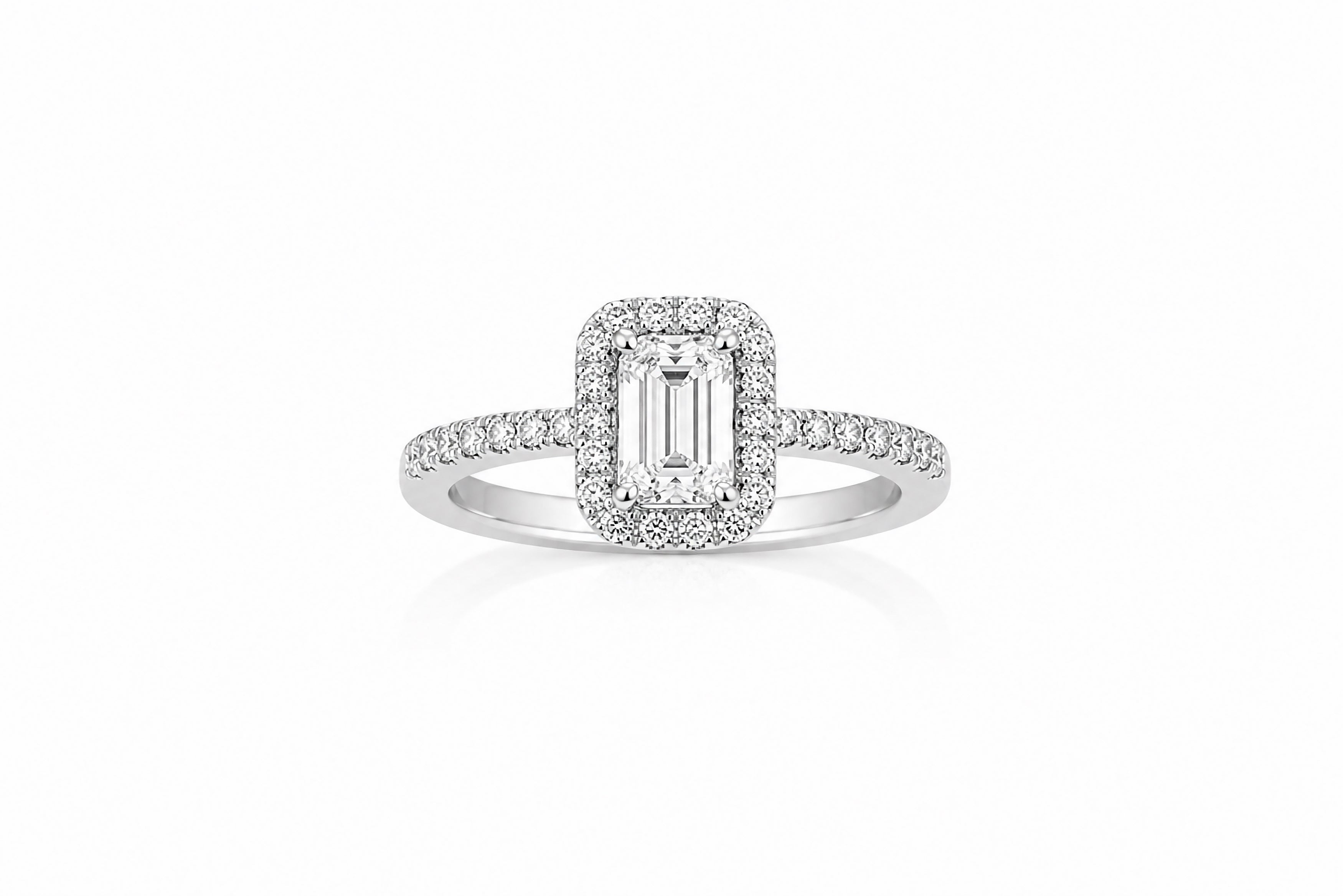 14K White Gold Halo Ring Featuring a 1.00ct H SI2 Emerald-Cut Diamond with .26ctw Diamond Accents