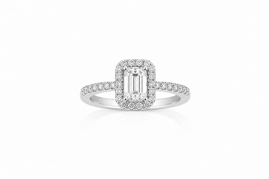 14K White Gold Halo Ring Featuring a 1.00ct H SI2 Emerald-Cut Diamond with .26ctw Diamond Accents