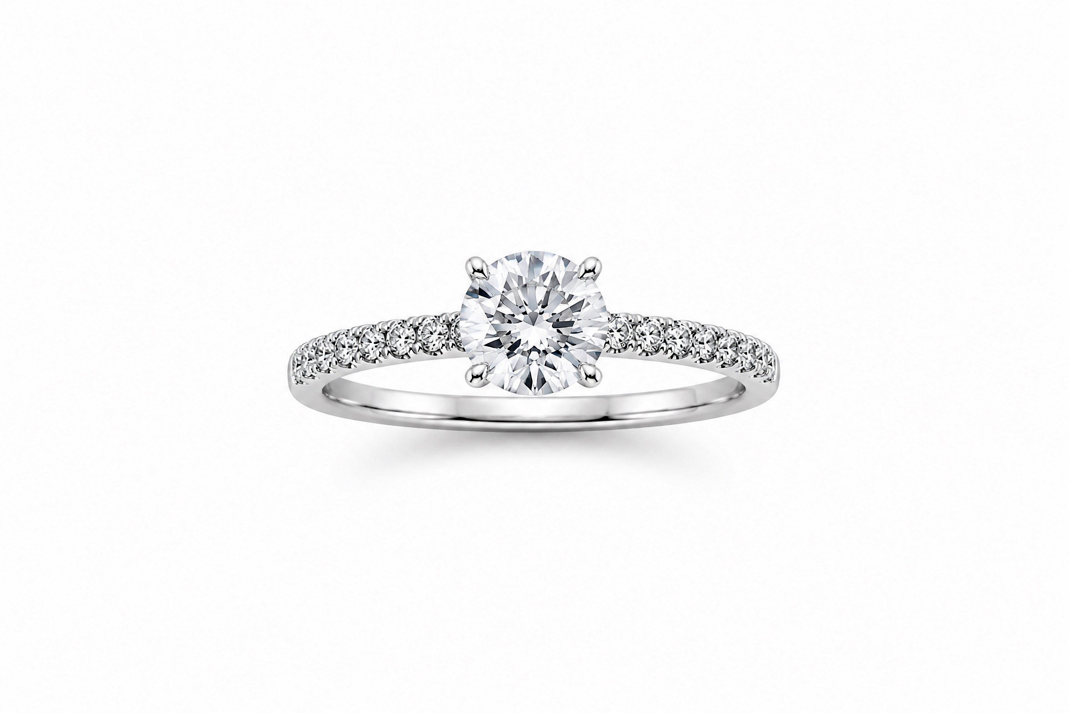 14K White Gold Engagement Ring Featuring a .74ct J VS1 Round Brilliant Diamond with .26ctw Diamond Accents