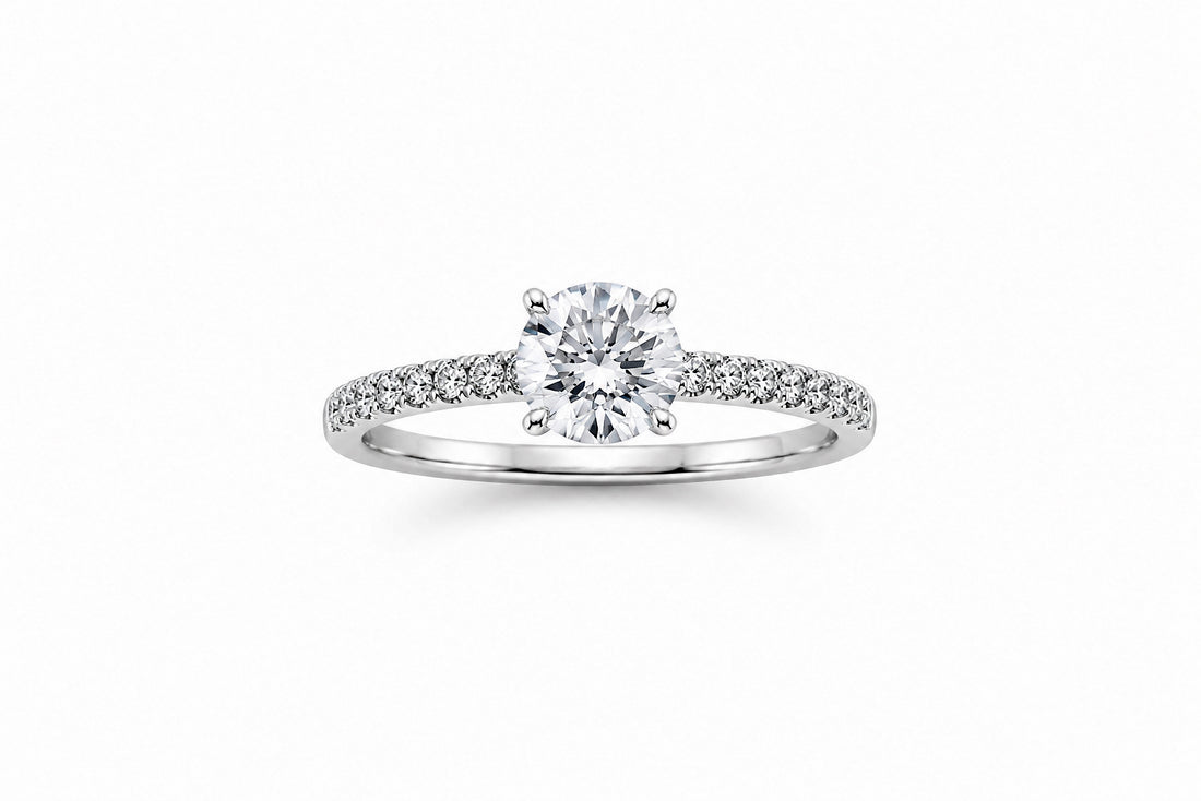 14K White Gold Engagement Ring Featuring a .74ct J VS1 Round Brilliant Diamond with .26ctw Diamond Accents