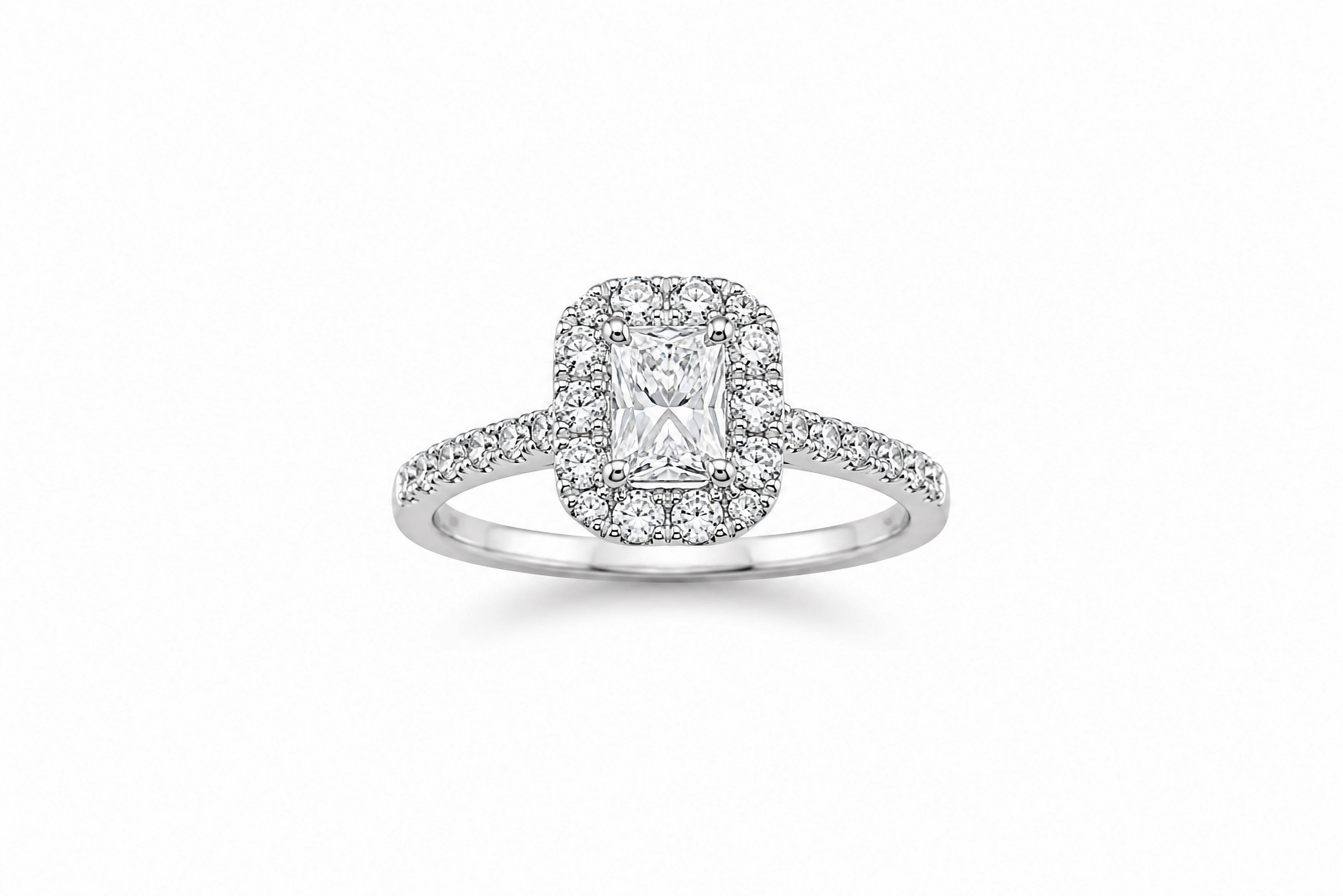 14K White Gold Halo Engagement Ring Featuring a .71ct I VS2 Elongated Radiant-Cut Diamond with .75ctw Diamond Accents