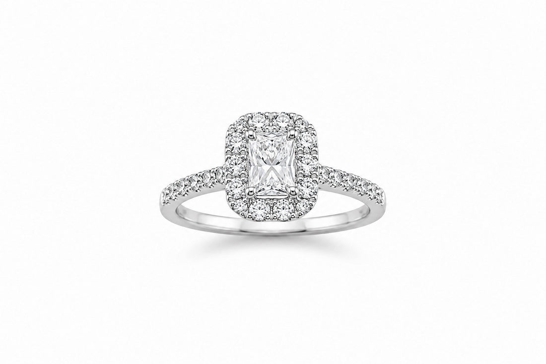 14K White Gold Halo Engagement Ring Featuring a .71ct I VS2 Elongated Radiant-Cut Diamond with .75ctw Diamond Accents