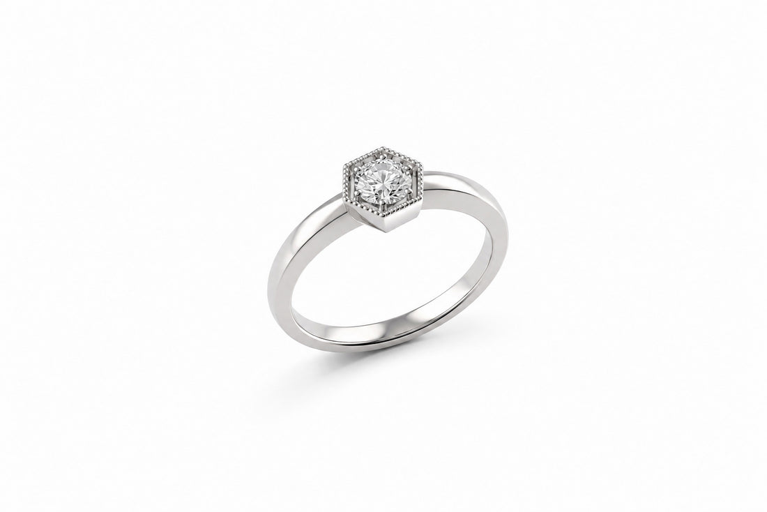 Platinum Ring Featuring a .43ct H VS1 Round Brilliant Diamond with a Milgrain Edge hexagon