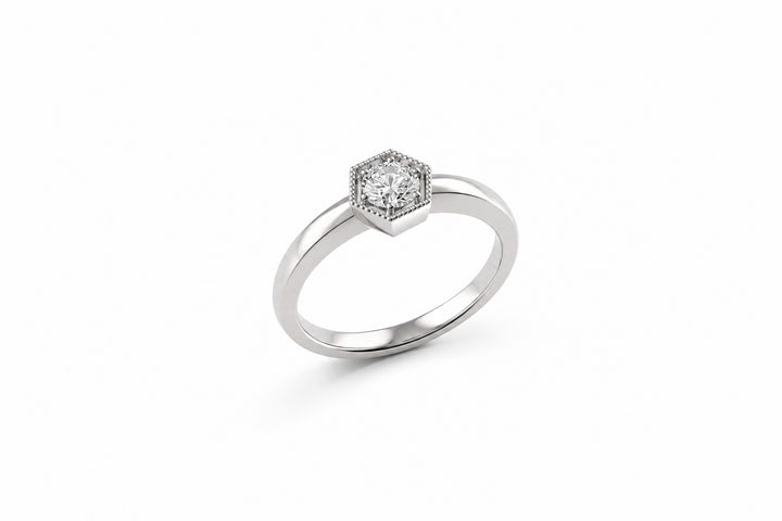 Platinum Ring Featuring a .43ct H VS1 Round Brilliant Diamond with a Milgrain Edge hexagon
