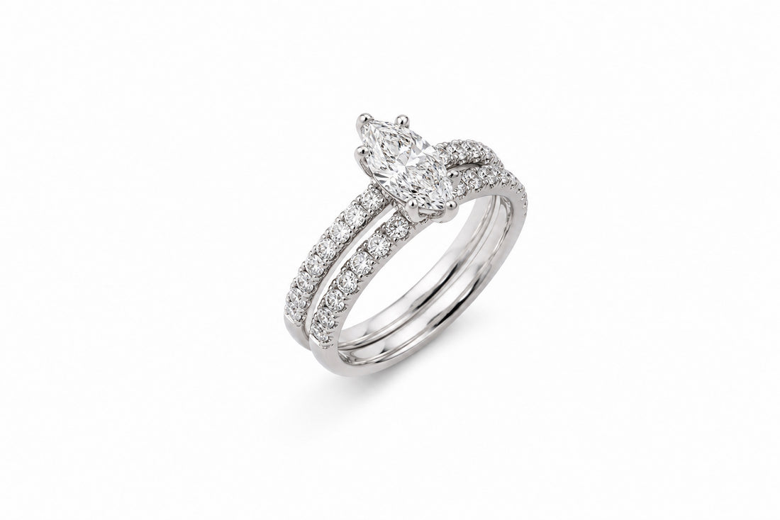 14K White Gold Bridal Set Featuring a .96ct E I1 Marquise-Cut Diamond with .52ctw Diamond Accents ring