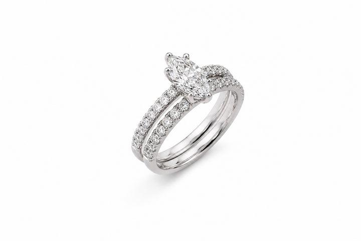 14K White Gold Bridal Set Featuring a .96ct E I1 Marquise-Cut Diamond with .52ctw Diamond Accents ring