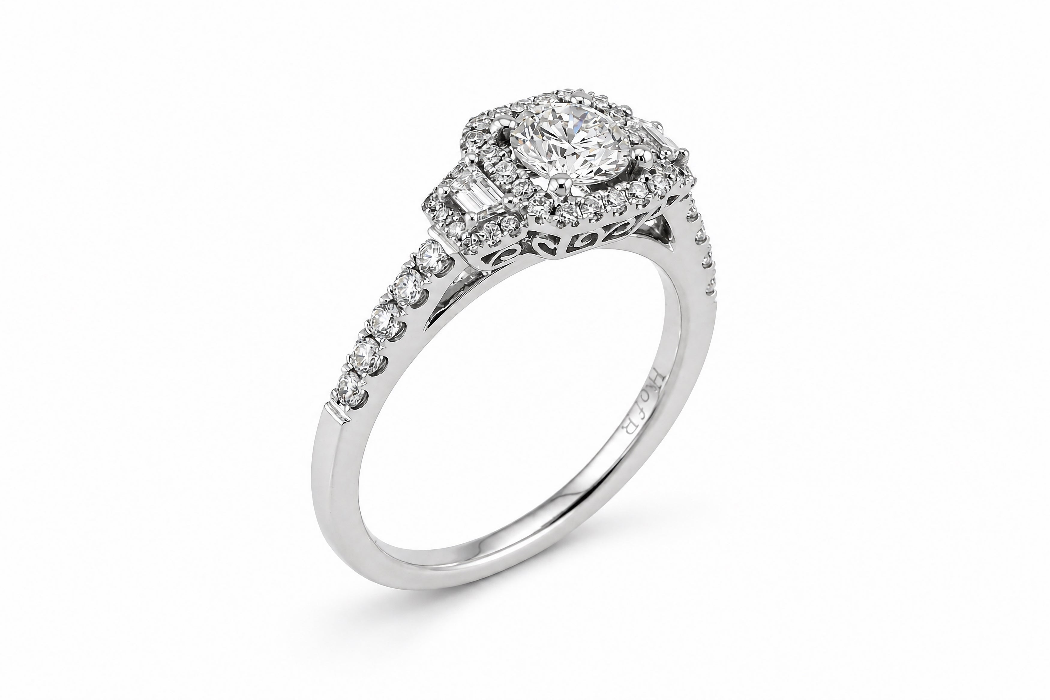14K white gold three-halo engagement ring with round center diamond and trapezoid diamond accents