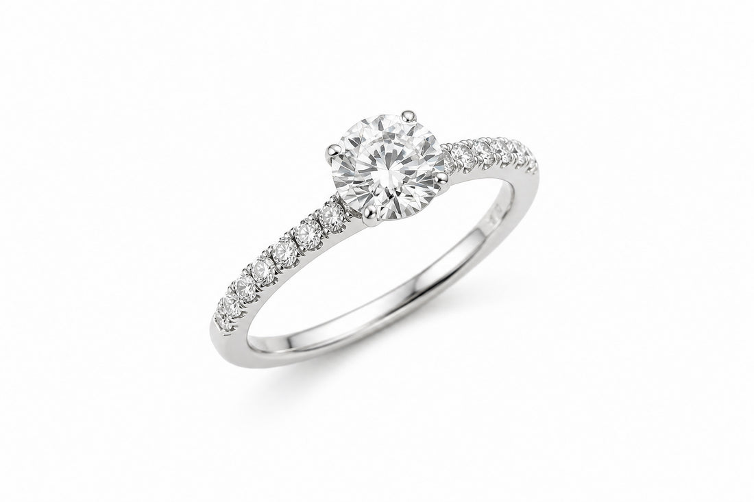 14K White Gold Engagement Ring Featuring a .74ct J VS1 Round Brilliant Diamond with .26ctw Diamond Accents