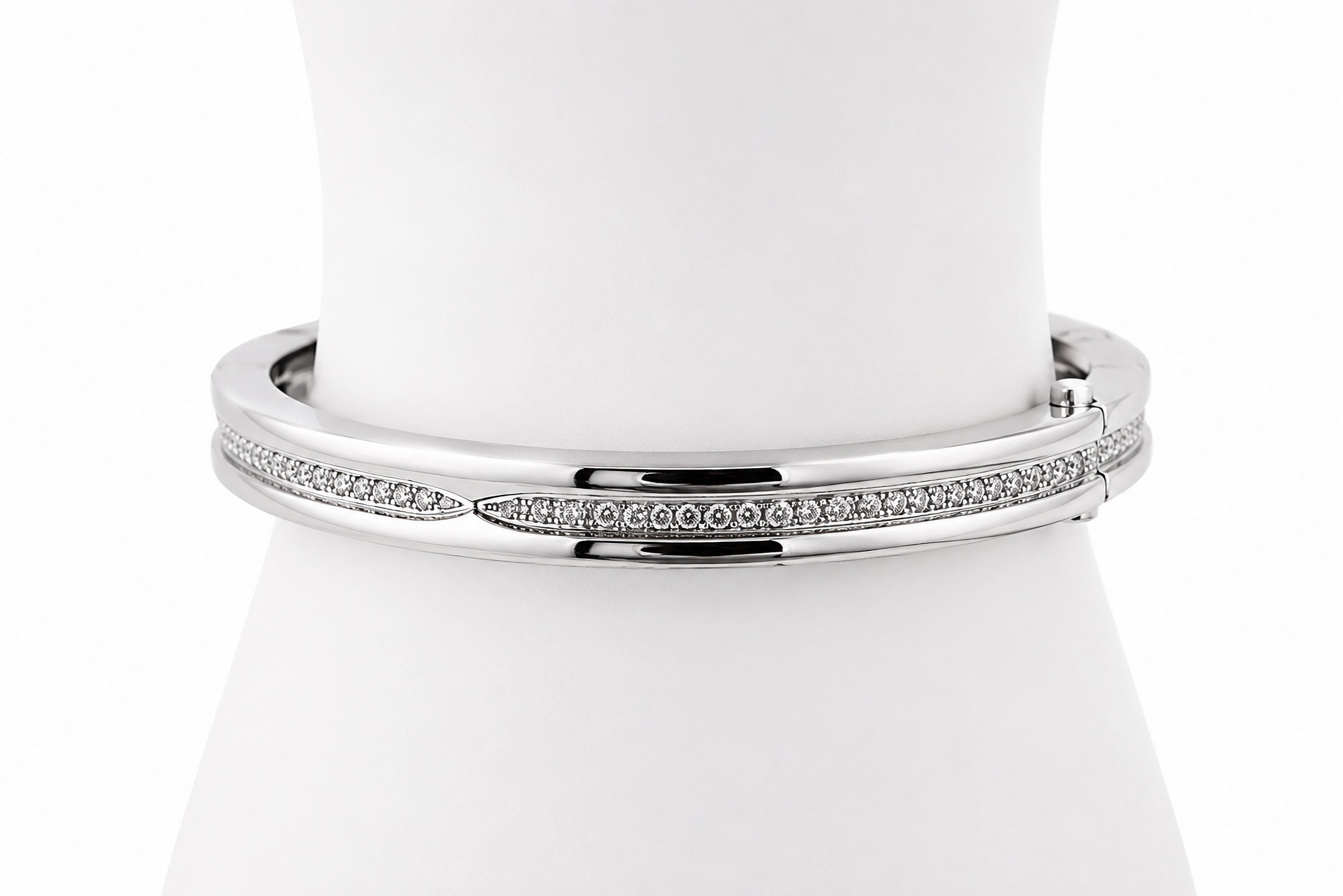18K White Gold Bulgari Diamond Bangle Bracelet Featuring 1.40ctw Diamonds, 58.48 Grams 