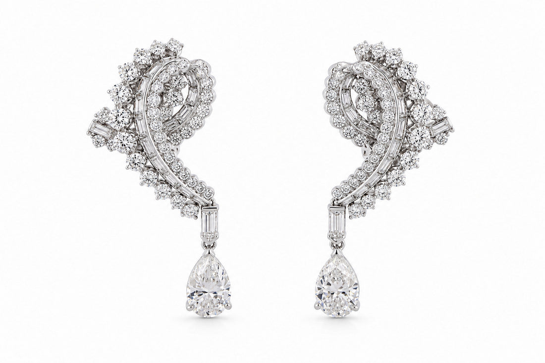 Diamond Earrings Featuring a 2.03ct GIA-Certified E VS1 Pear-Shaped Diamond, a 2.11ct GIA-Certified E VS1 Pear-Shaped Diamond, 4.34ctw Round Diamonds, .61ctw Baguette Diamonds, and .60ctw Bullet-Shaped Diamonds (Convertible Non-Pierced)