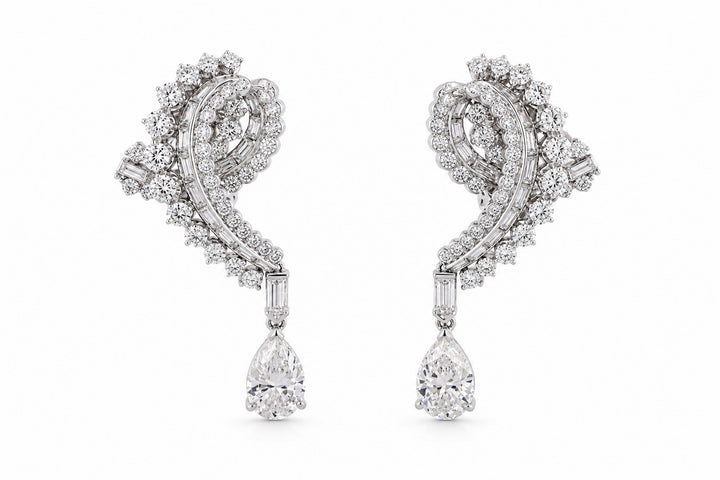 Diamond Earrings Featuring a 2.03ct GIA-Certified E VS1 Pear-Shaped Diamond, a 2.11ct GIA-Certified E VS1 Pear-Shaped Diamond, 4.34ctw Round Diamonds, .61ctw Baguette Diamonds, and .60ctw Bullet-Shaped Diamonds (Convertible Non-Pierced)
